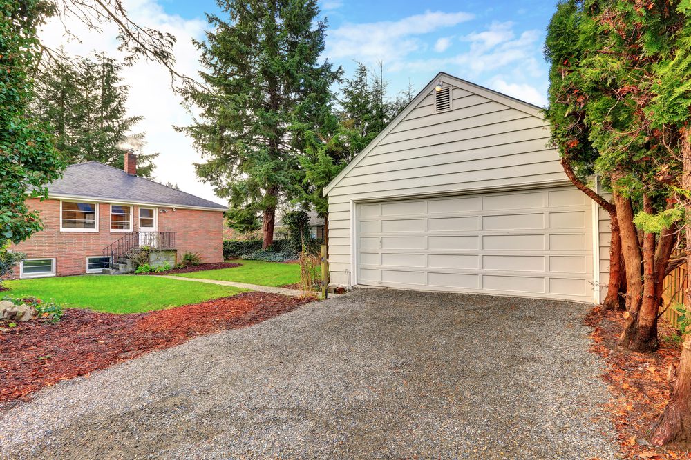 Detached Garage Of A Red Brick House.